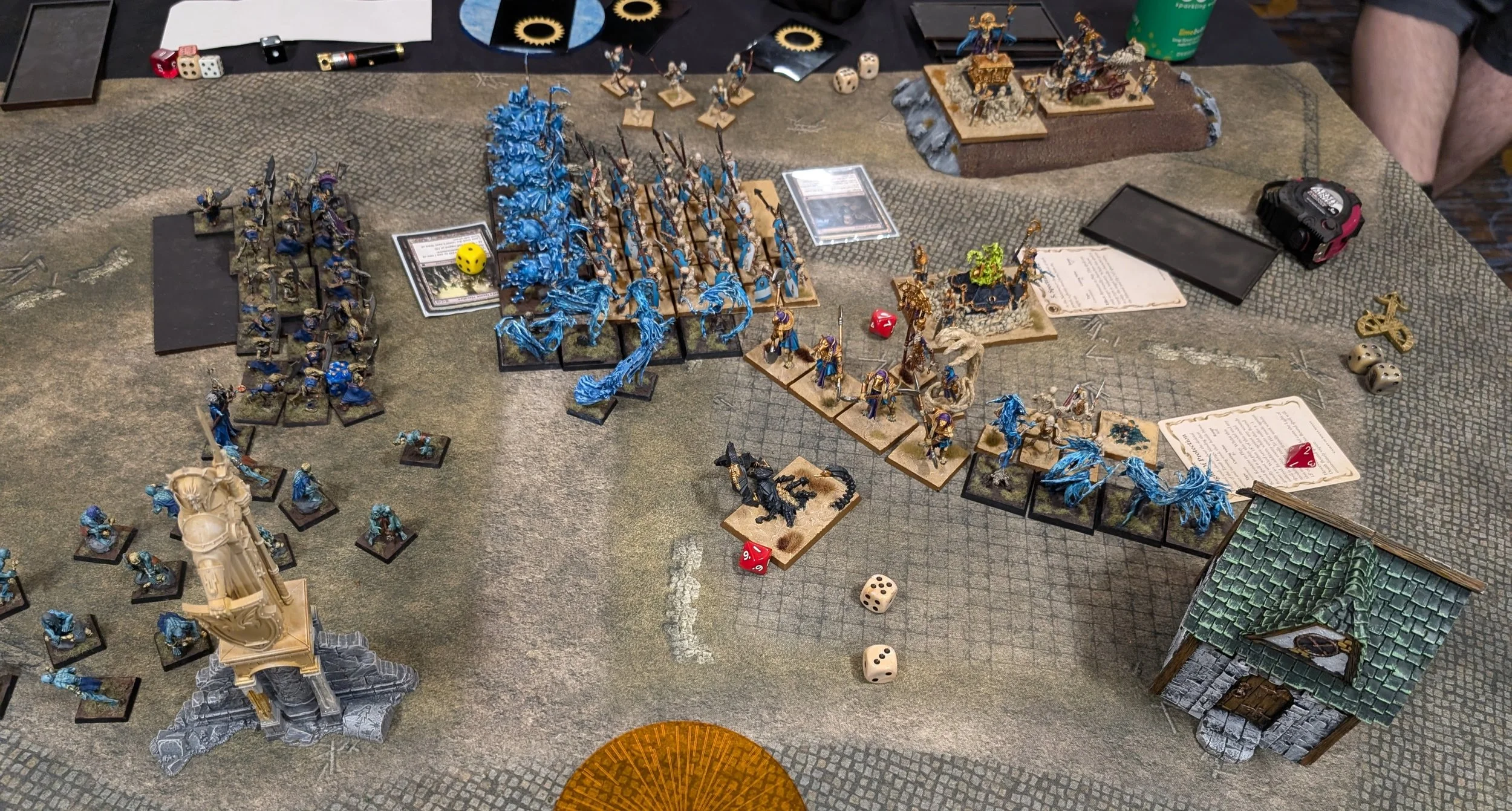 Later in the same game: blue ethereal Vampire Counts units are locked against the remaining skeleton regiments, both dragons gone from the table.