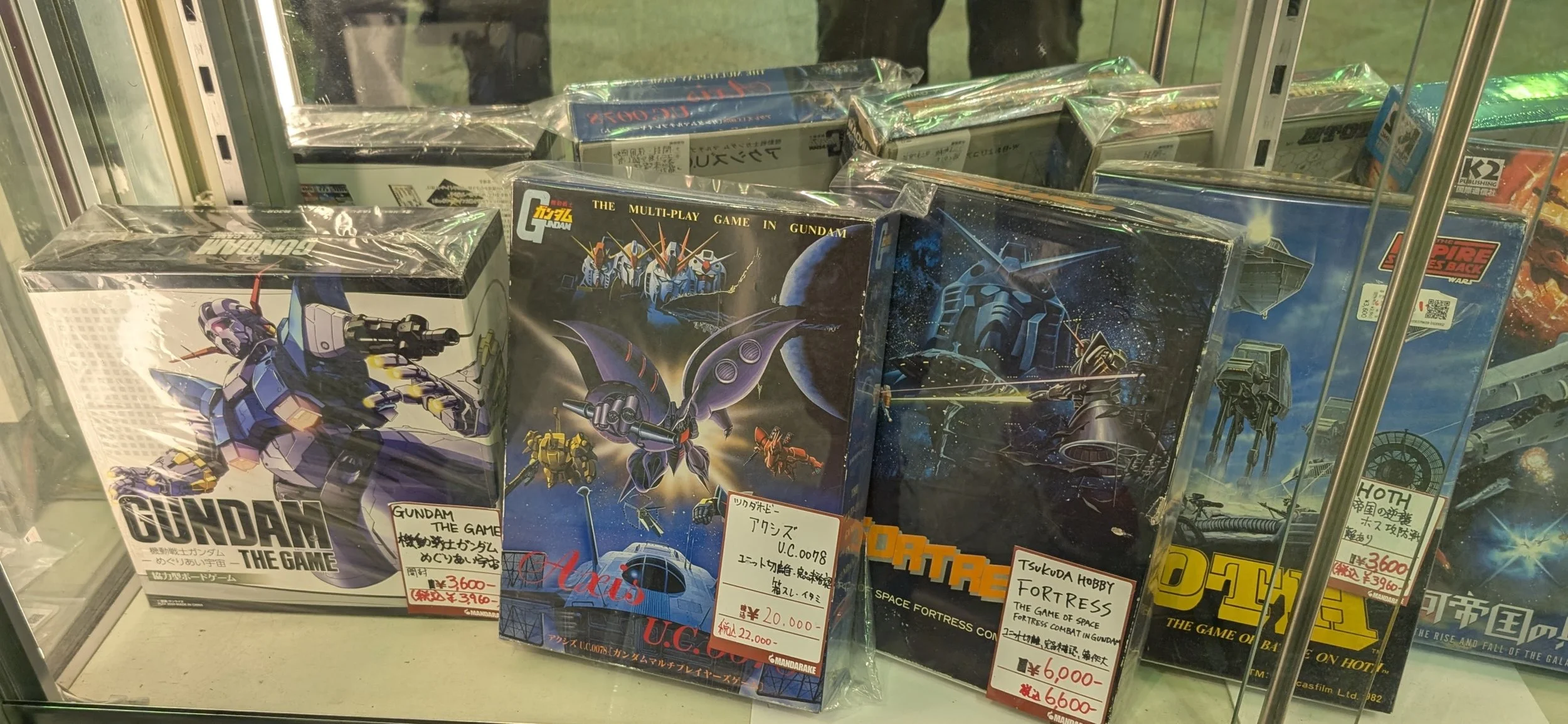 A crowded hobby shop shelf at Nakano Broadway.