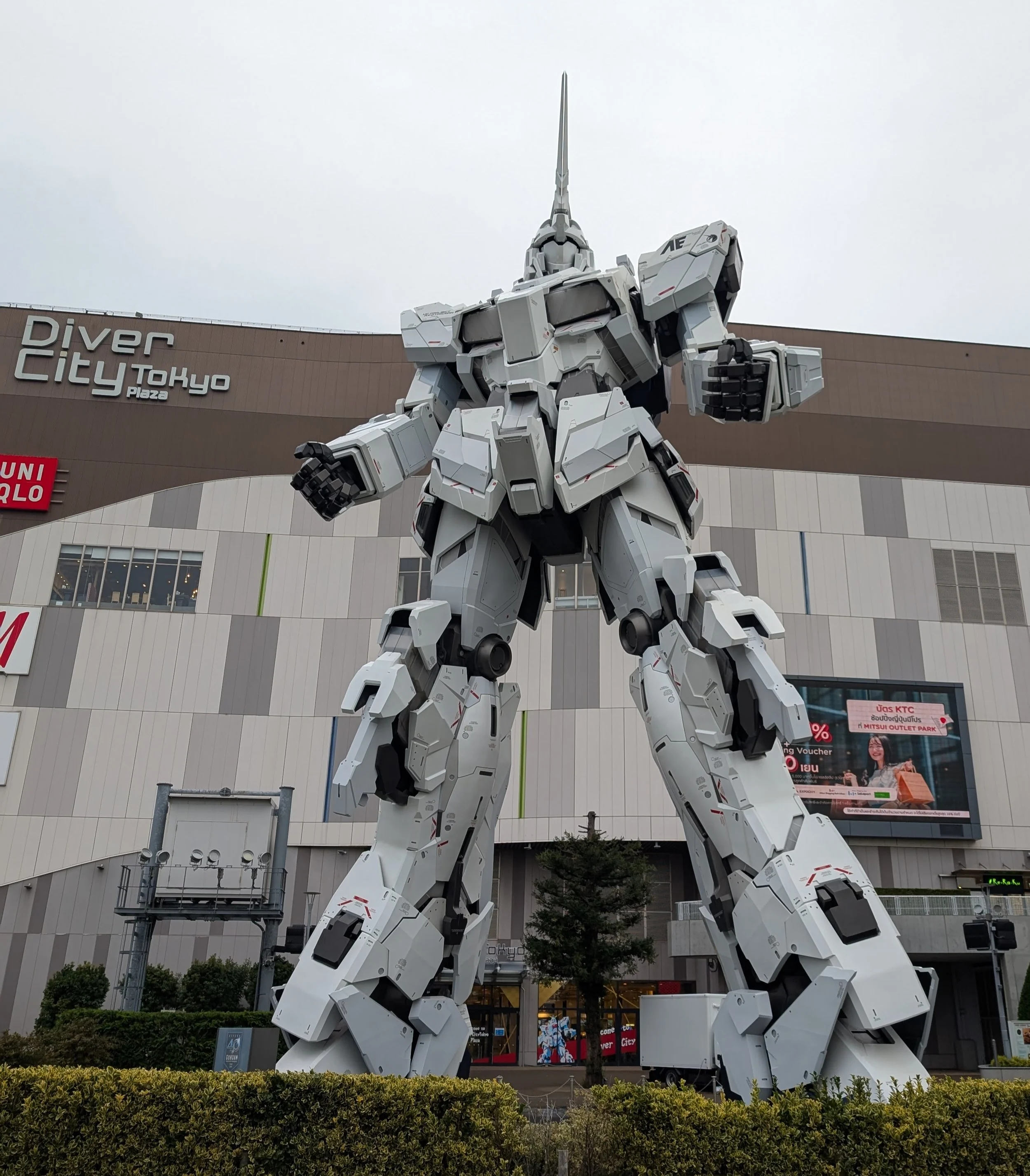 A Gundam display model shown inside the Gundam store.