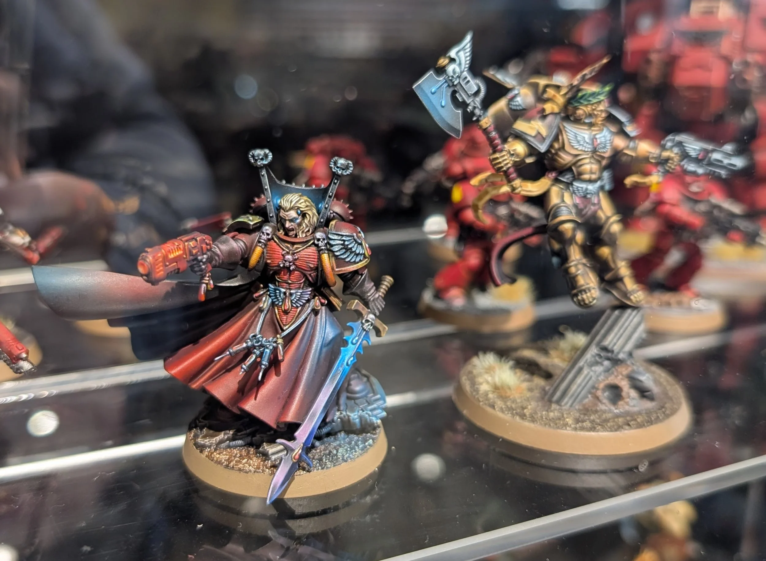 Shelves of Warhammer products at Warhammer Cafe Tokyo.