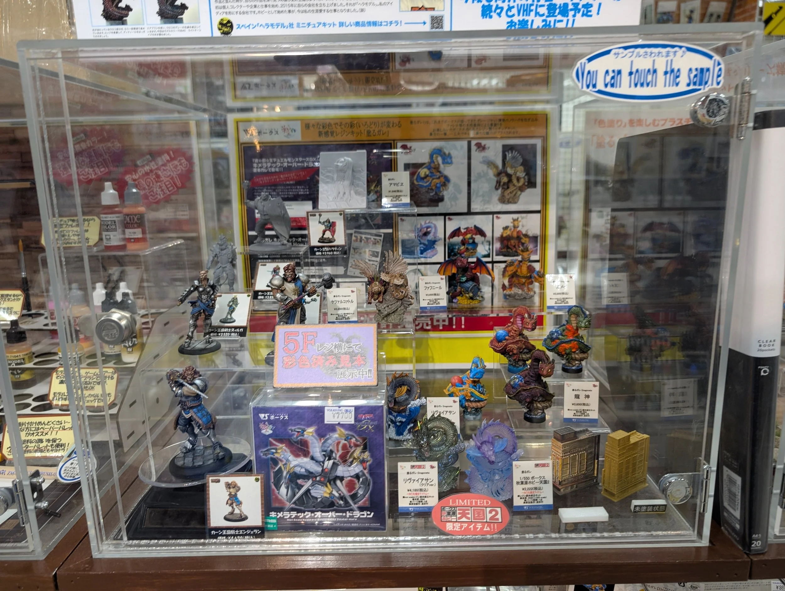 A Tokyo hobby shop display with boxed model products.