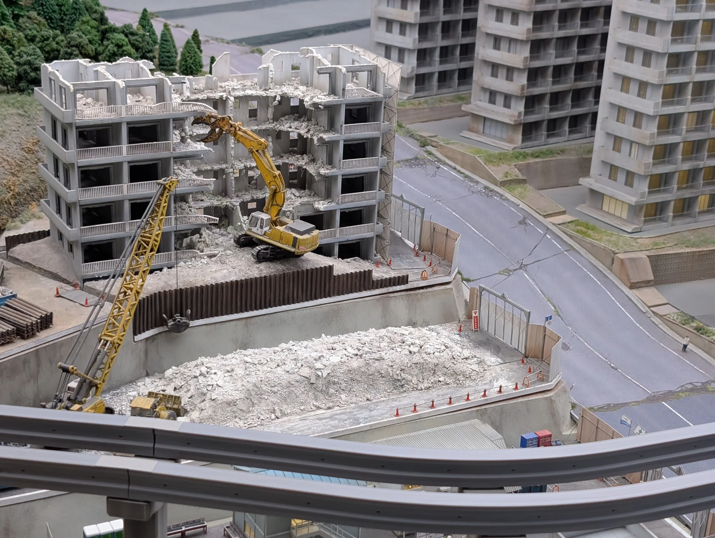 A miniature city display with dense buildings and lighting.