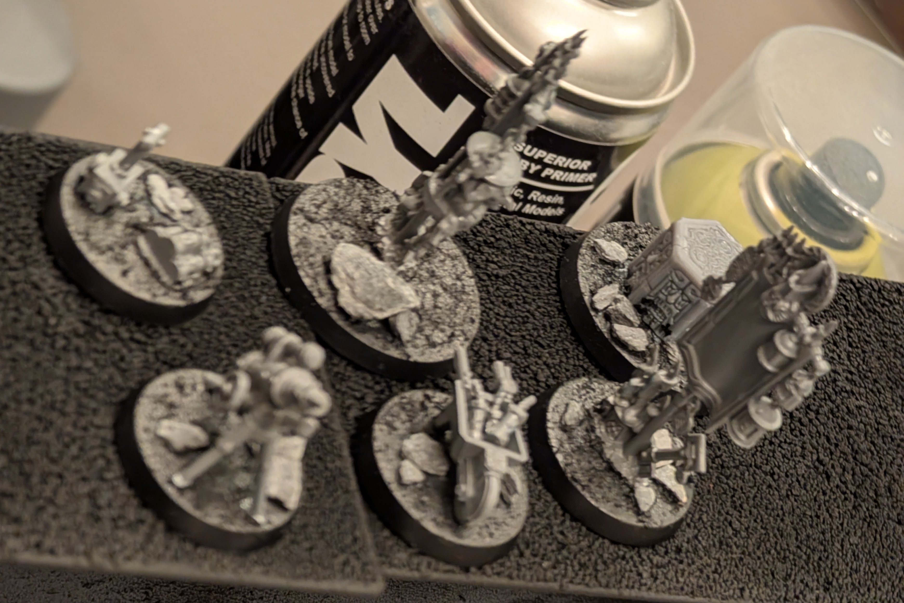 Unpainted kitbashed dwarf objective and mining markers for Old World