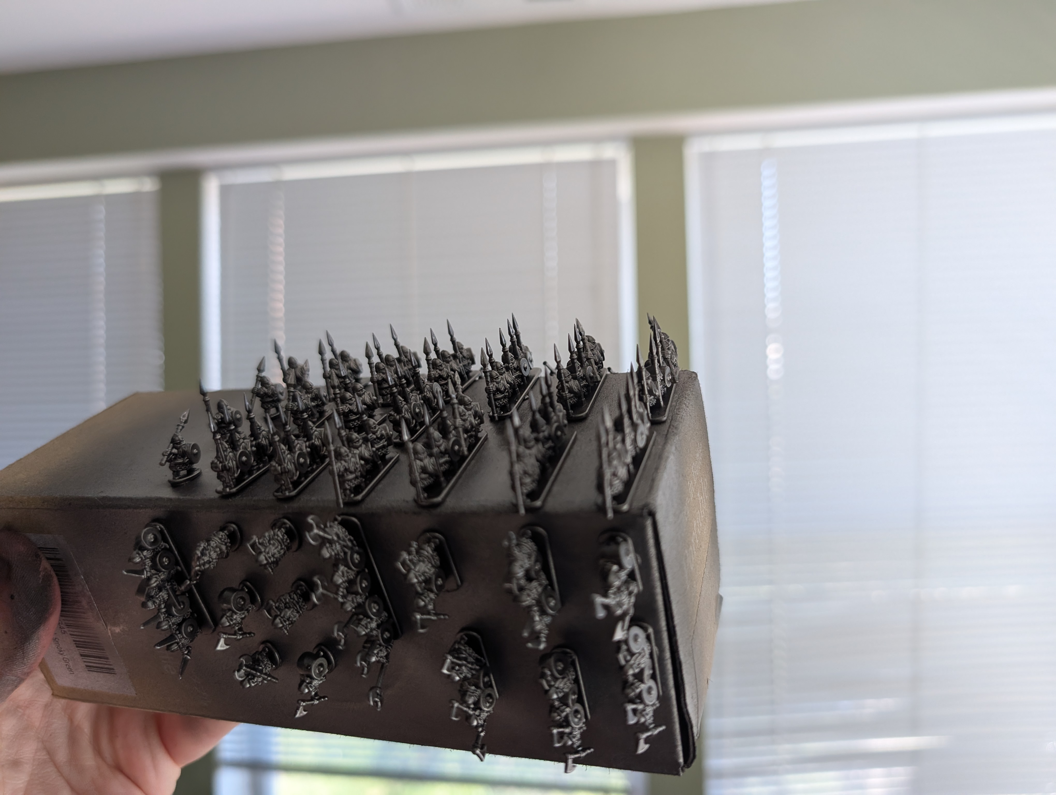 Warmaster infanty stuck to a cardboard box sprayed silver